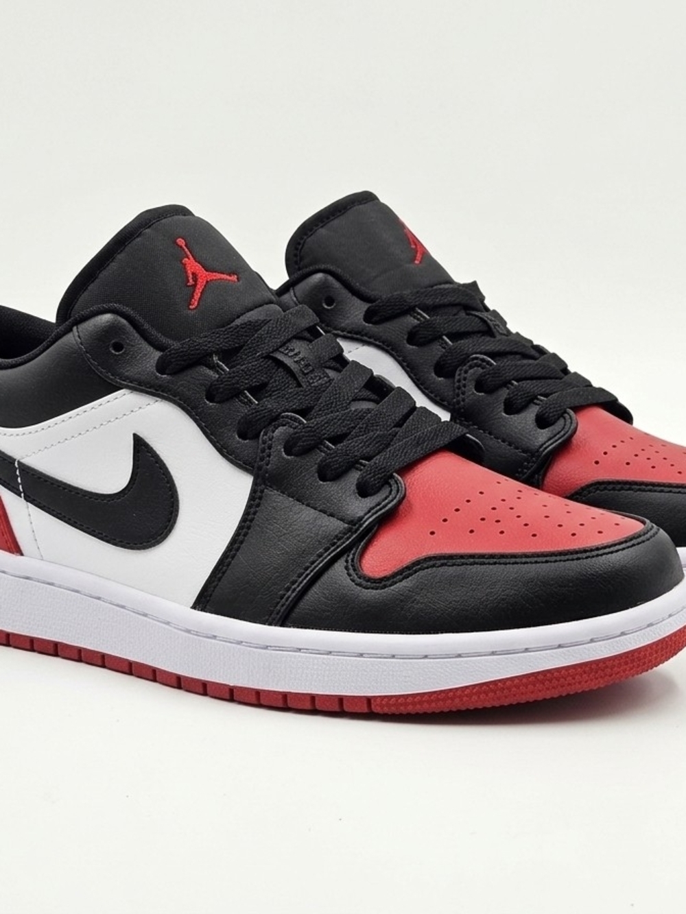 Nike Air Jordan Low Top Sneakers - Black / White / Red